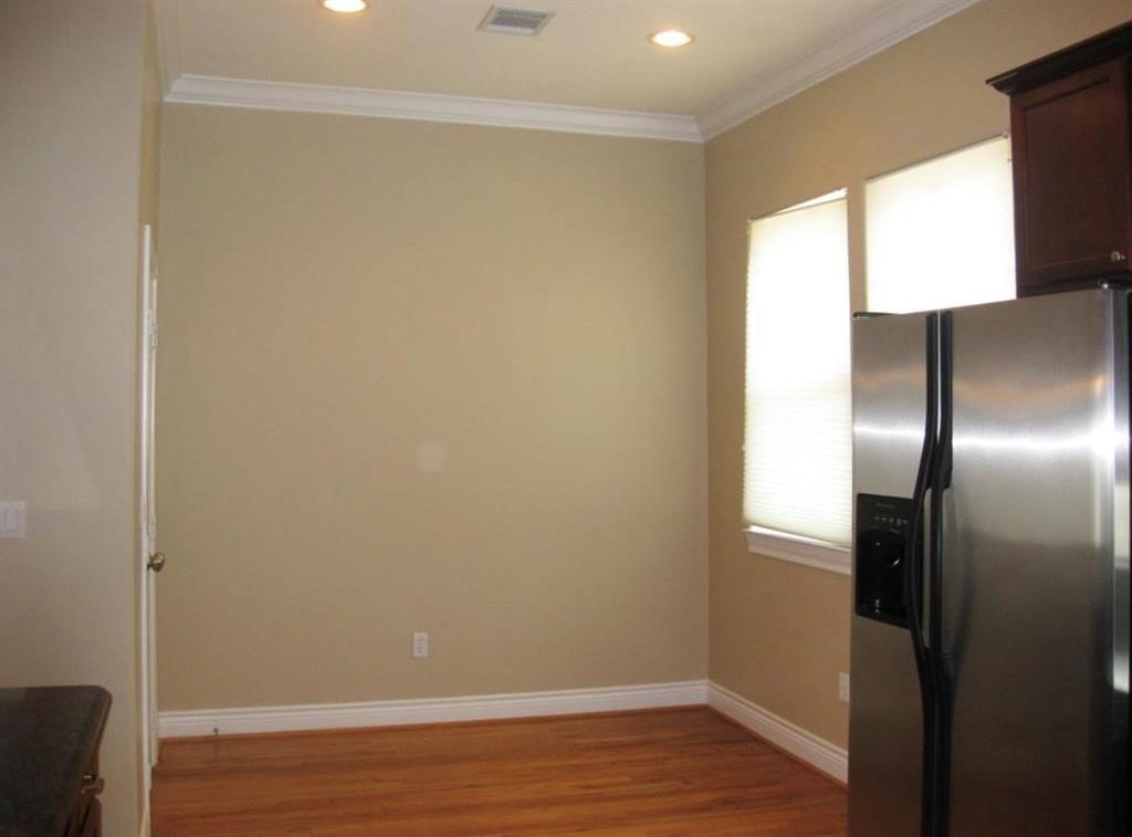 1623 Stuart Street Houston, TX 77004 - Photo 12 of 24 Breakfast area and doors to the pantry