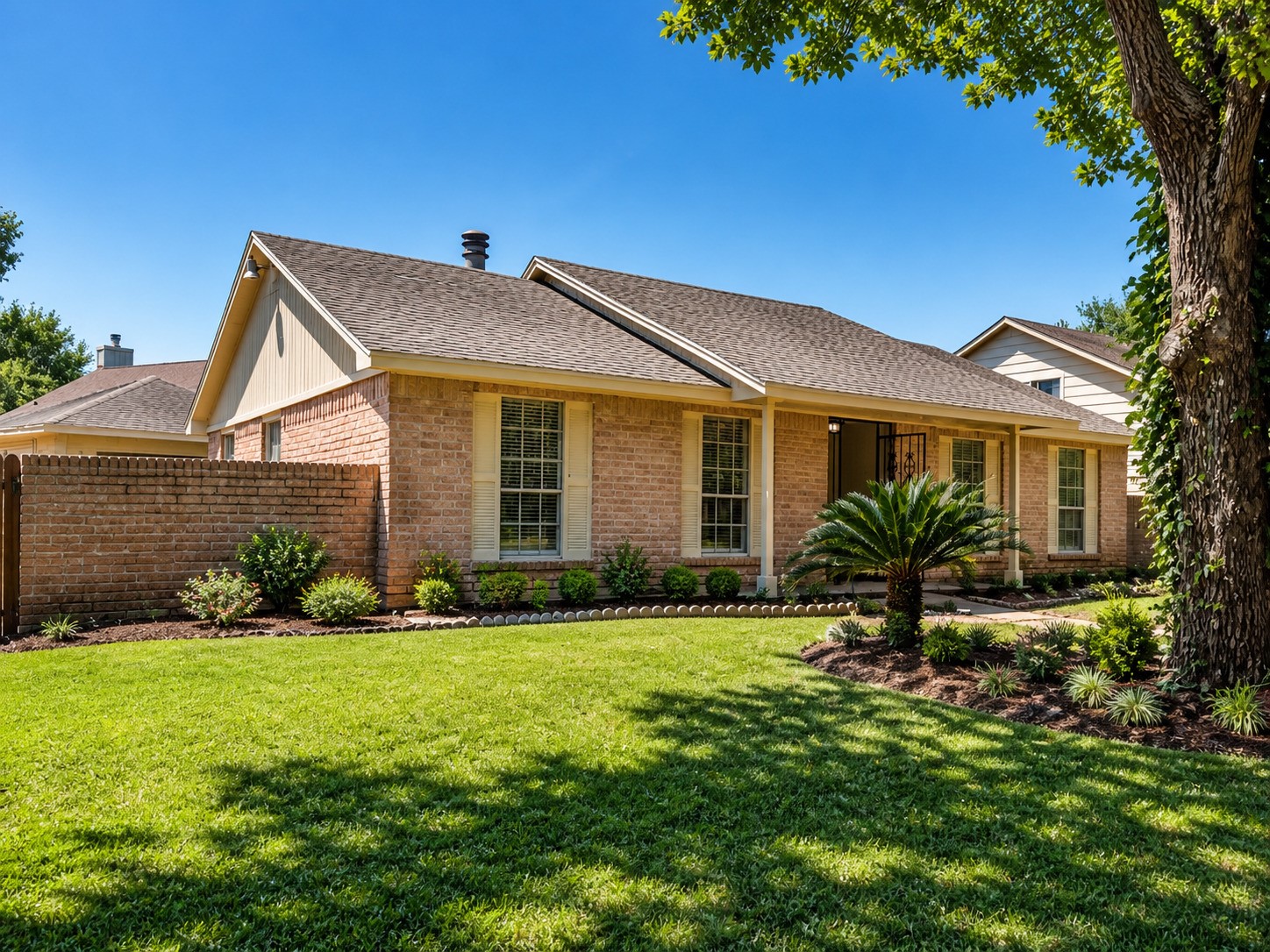 15950 Chimney Rock Road Missouri City, TX 77489 - Photo 1 of 9 a front view of a house with a yard and garage