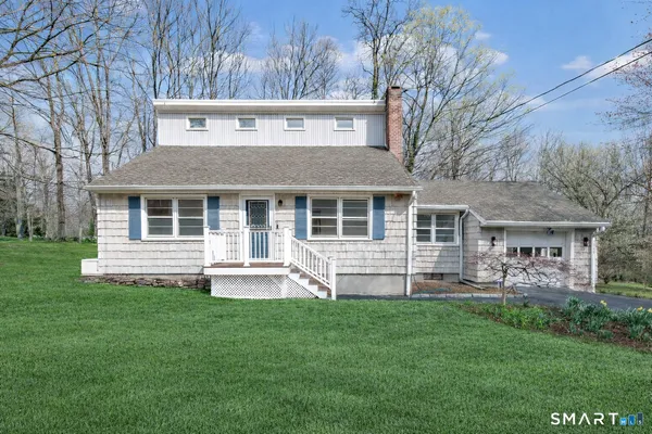 a house view with a garden space