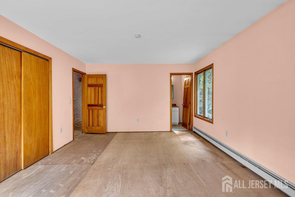 213 East Greystone Road Old Bridge, NJ 08857 - Photo 11 of 32 a view of an empty room and window