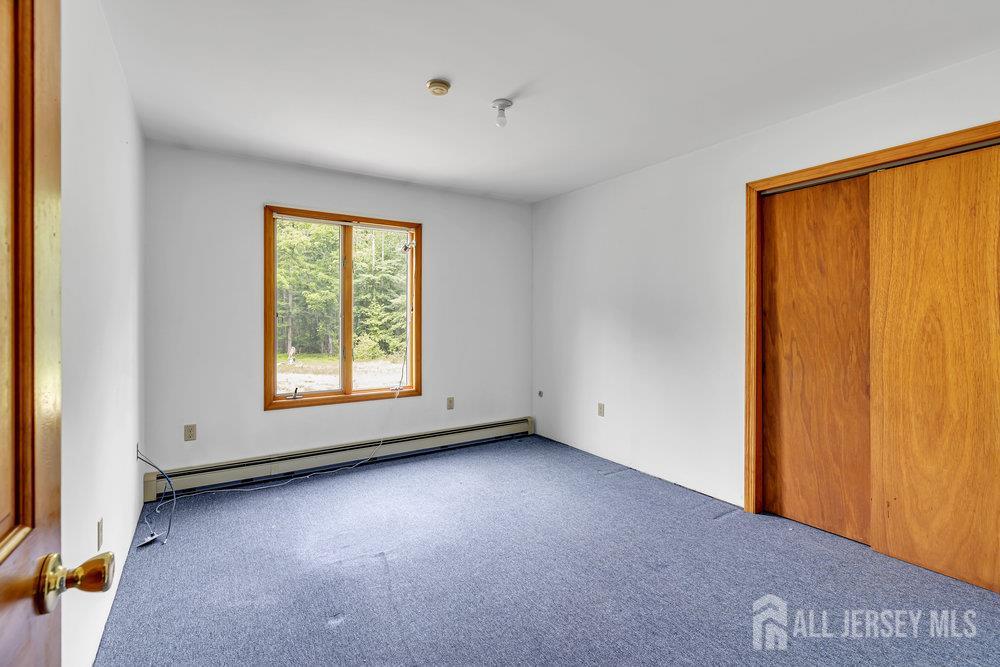 213 East Greystone Road Old Bridge, NJ 08857 - Photo 15 of 32 an empty room with a window