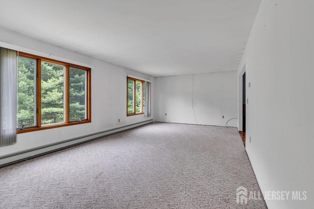 213 East Greystone Road Old Bridge, NJ 08857 - Photo 23 of 32 an empty room with windows