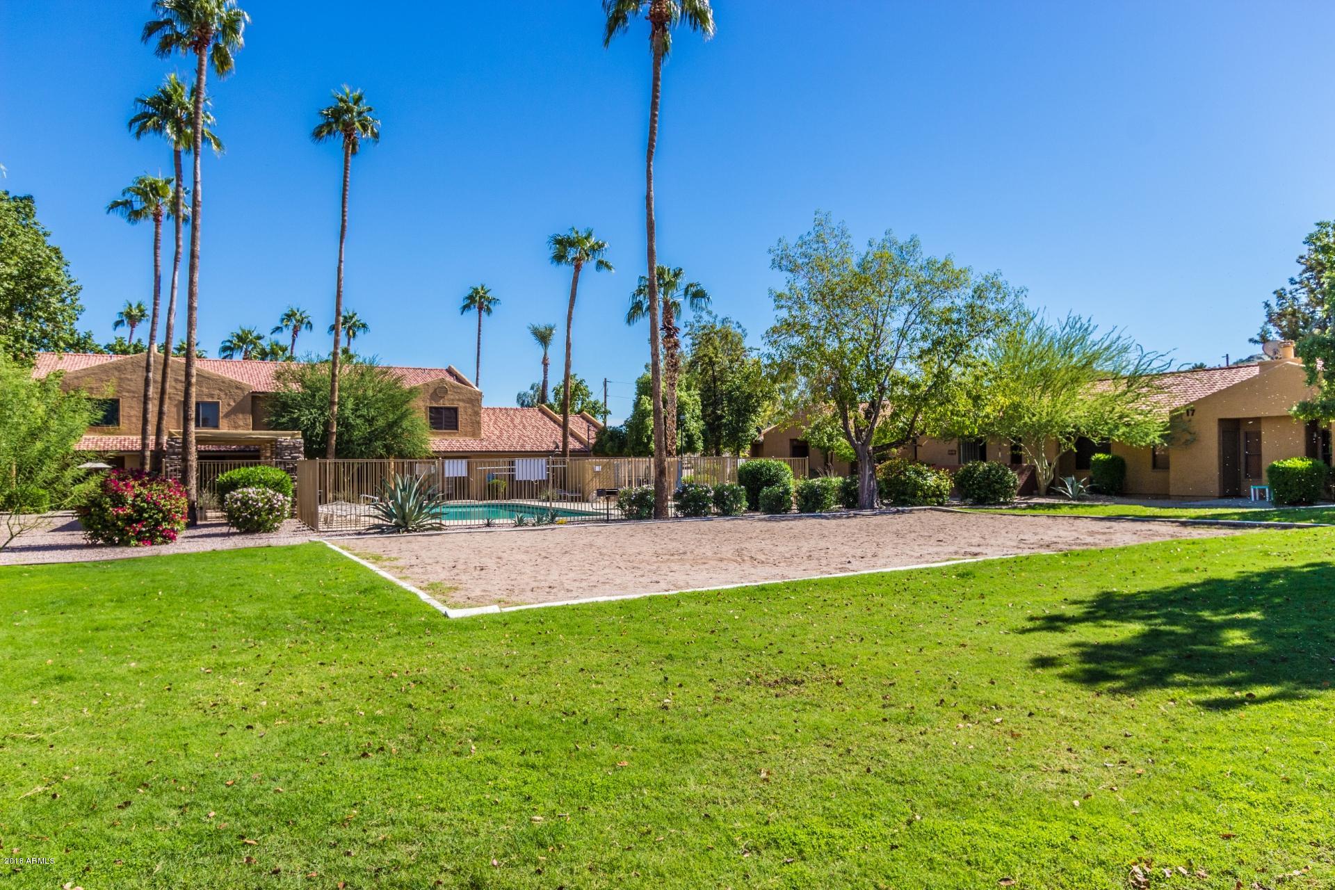 3511 East Baseline Road, Unit 1082 Phoenix, AZ 85042 - Photo 20 of 23 a view of a fountain in front of house