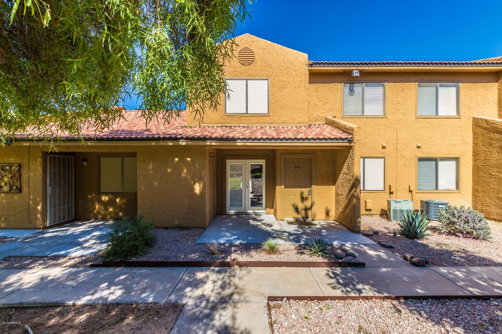 3511 East Baseline Road, Unit 1082 Phoenix, AZ 85042 - Photo 2 of 23 a front view of a house