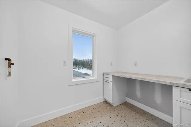 an empty room with windows