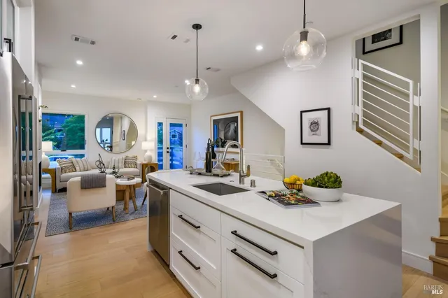 a view of living room with granite countertop furniture and fireplace