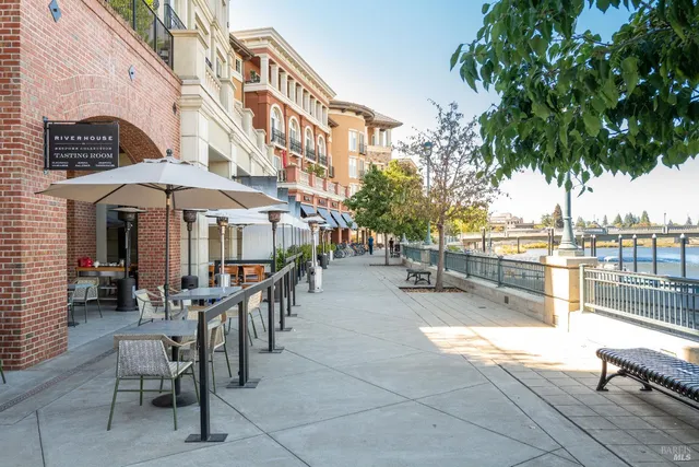 a view of a chairs and table in the patio