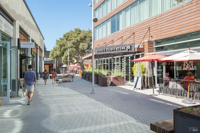 a view of a building with sitting area