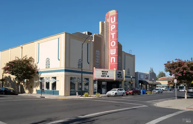a view of a building and a street