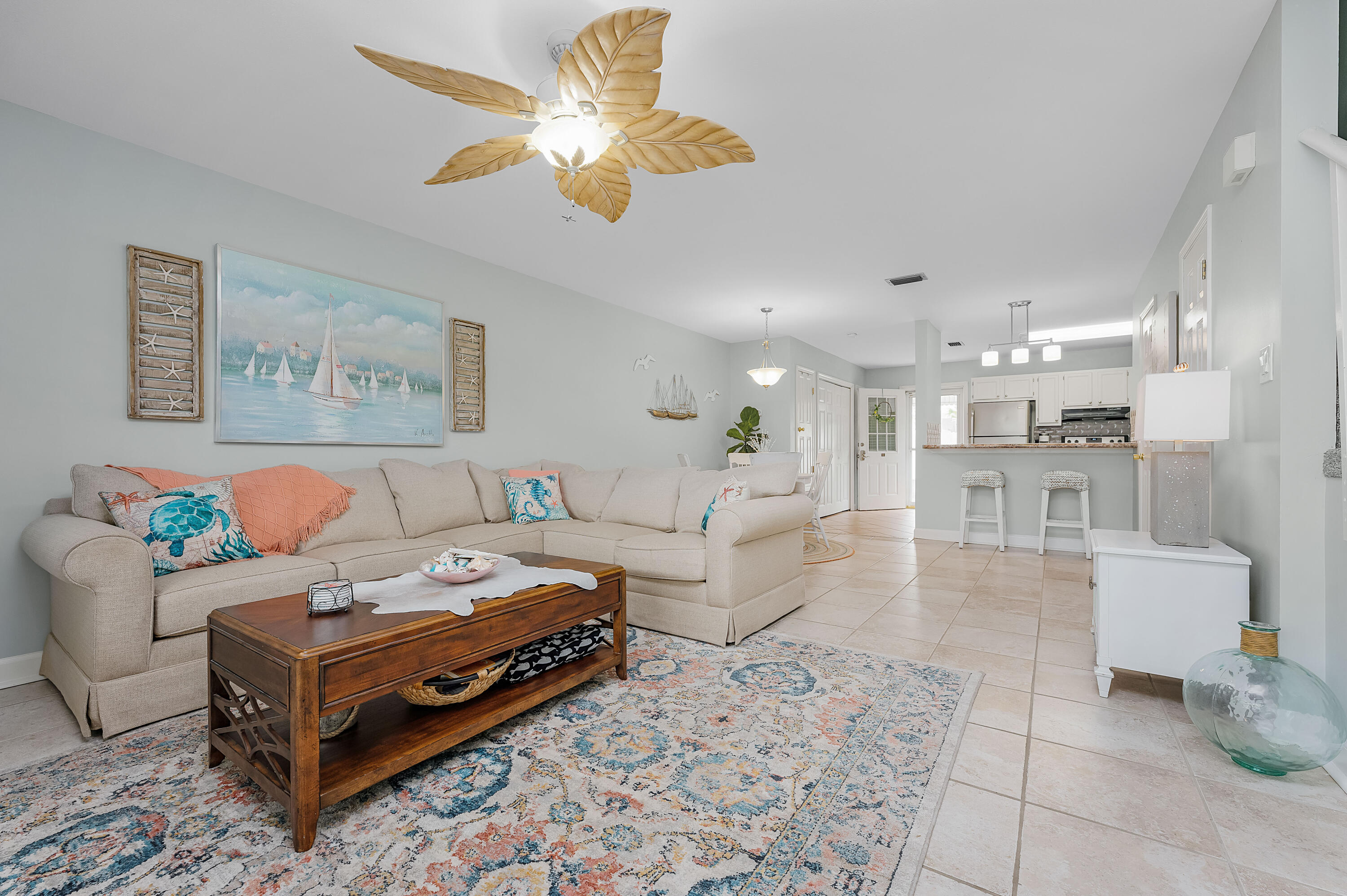 241 Ellis Road, Unit 43 Miramar Beach, FL 32550 - Photo 3 of 43 a living room with furniture and a view of kitchen