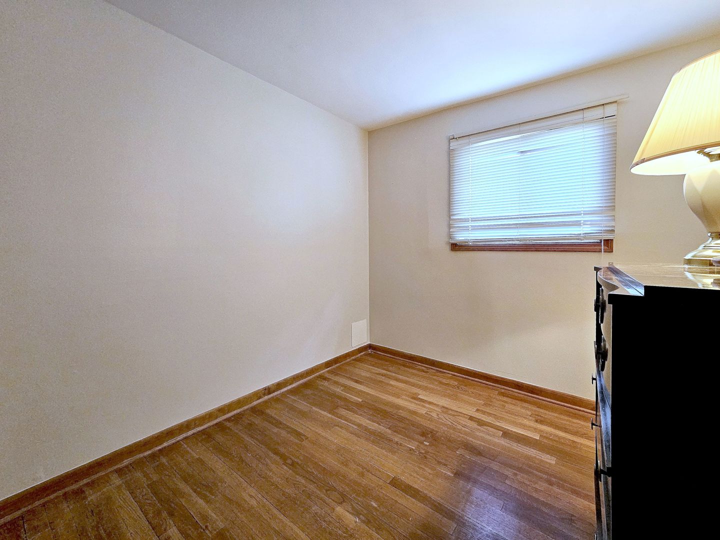 357 North Pioneer Drive Addison, IL 60101 - Photo 13 of 26 a view of a room with wooden floor and closet