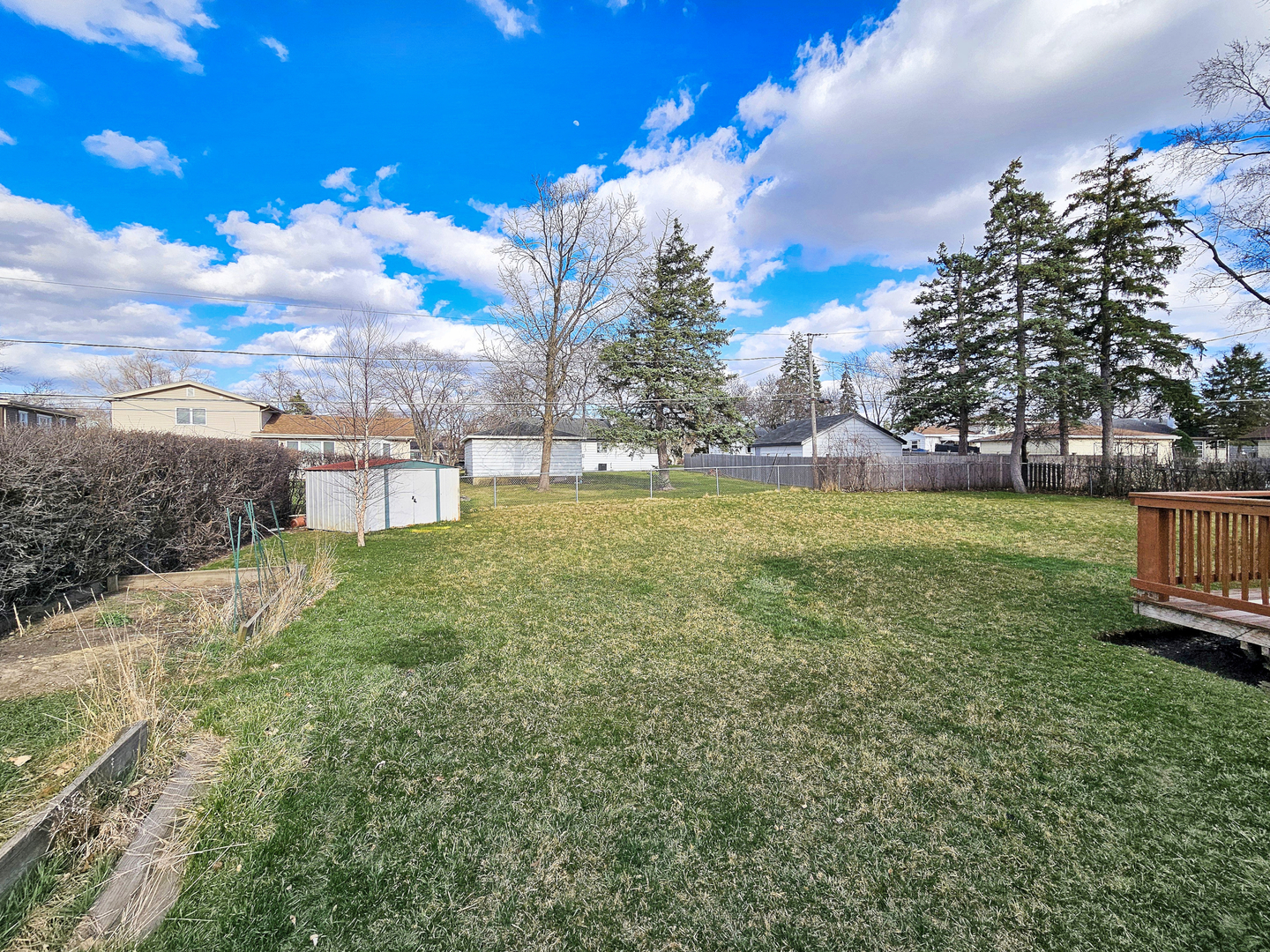 357 North Pioneer Drive Addison, IL 60101 - Photo 25 of 26 a view of a lake with a big yard