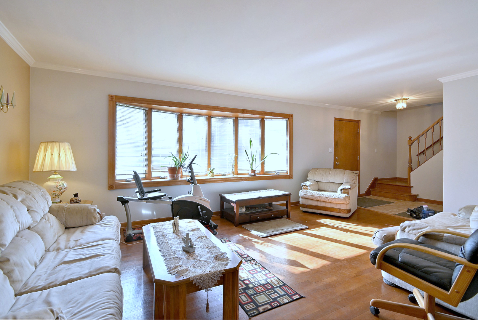 357 North Pioneer Drive Addison, IL 60101 - Photo 3 of 26 a living room with furniture and a large window