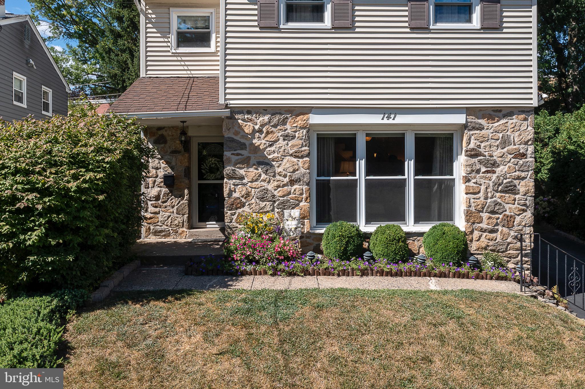 141 Lewis Road Havertown, PA 19083 - Photo 4 of 33 a front view of a house with a yard