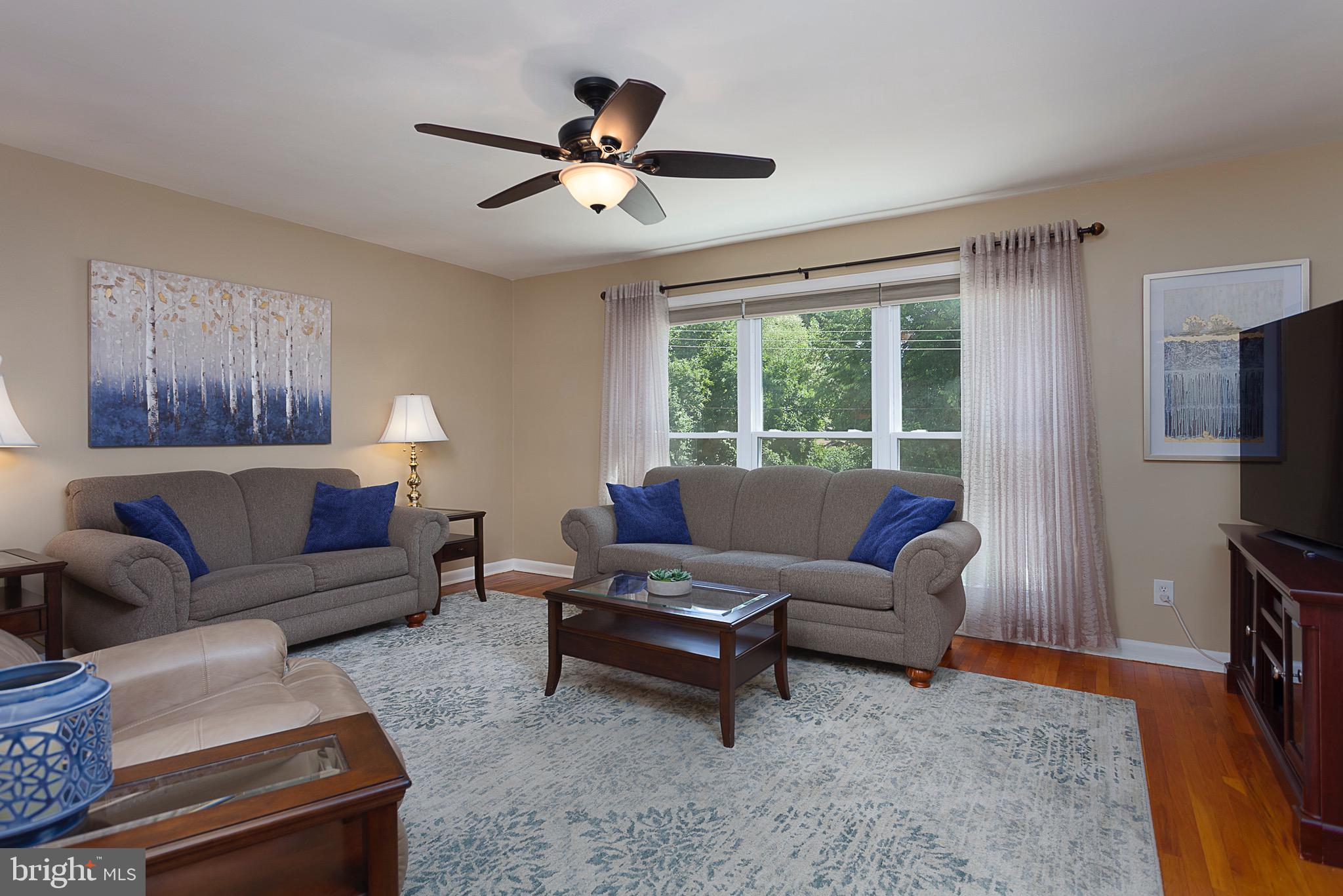 141 Lewis Road Havertown, PA 19083 - Photo 8 of 33 a living room with furniture and a flat screen tv