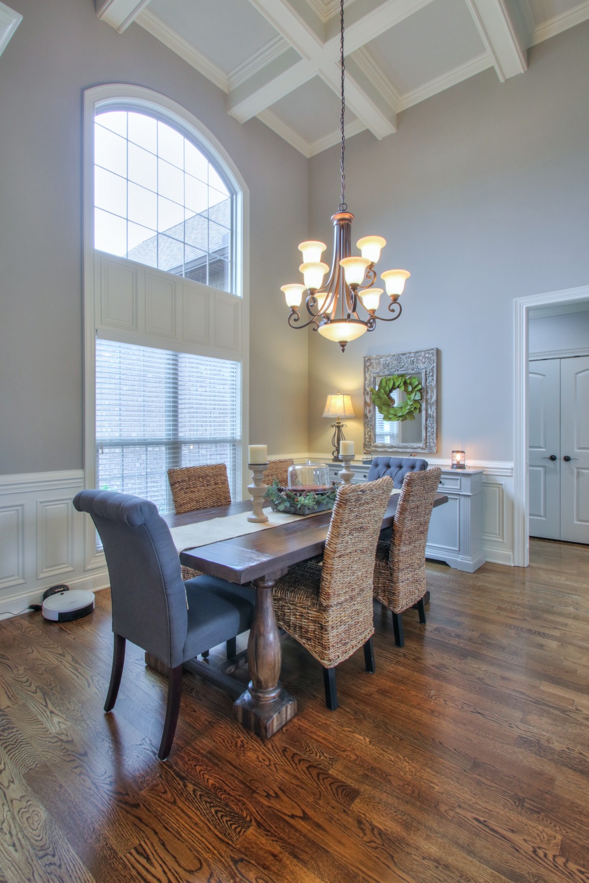 678 Academy Road Lebanon, TN 37087 - Photo 38 of 48 a dining room with wooden floor a chandelier a wooden table and chairs