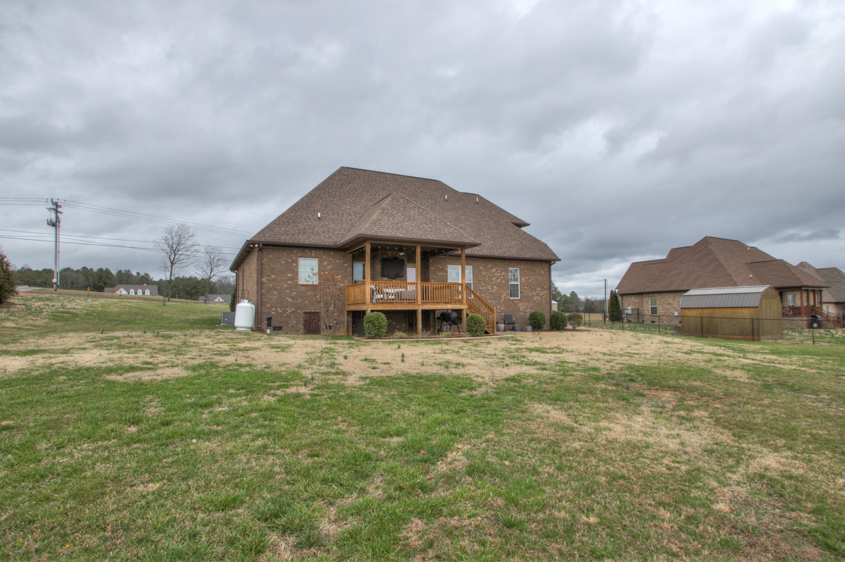 678 Academy Road Lebanon, TN 37087 - Photo 8 of 48 a front view of a house with a garden and yard