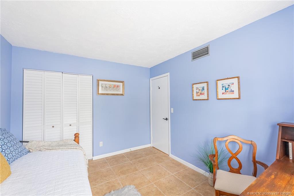 3171 Southeast Aster Lane, Unit 1103 Stuart, FL 34994 - Photo 14 of 26 a view of an empty room