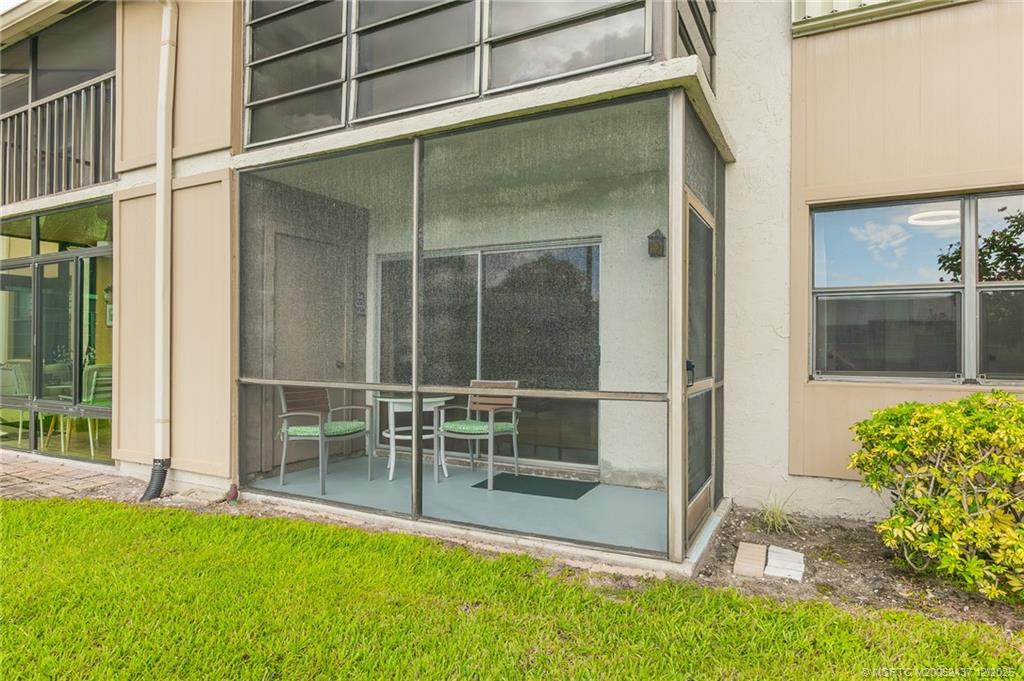 3171 Southeast Aster Lane, Unit 1103 Stuart, FL 34994 - Photo 20 of 26 a view of front door and porch