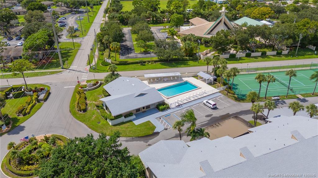 3171 Southeast Aster Lane, Unit 1103 Stuart, FL 34994 - Photo 25 of 26 an aerial view of a house with garden space and street view