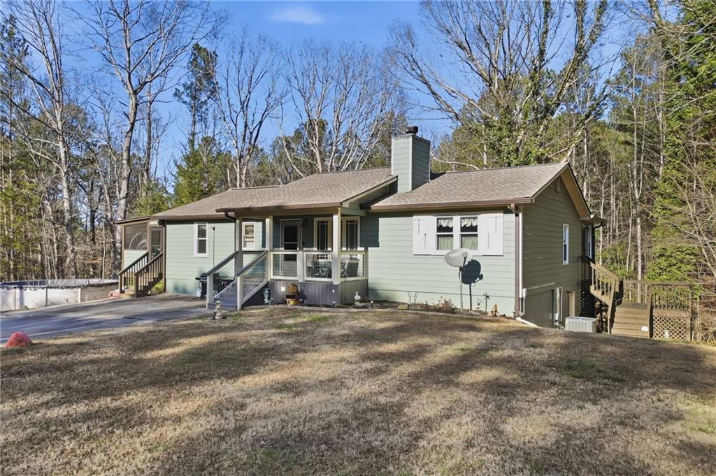 259 Gramling Trail Canton, GA 30114 - Photo 1 of 1 a front view of a house with a yard