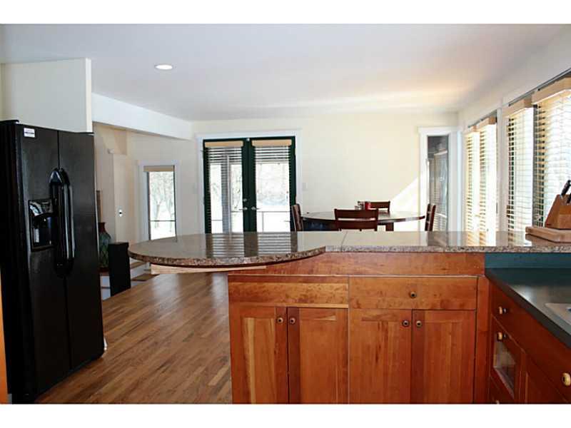 47 Shephard Road Gibsonia, PA 15044 - Photo 4 of 25 Kitchen. The kitchen is light and bright with a granite island and handsome cabinetry and is connected to a large, but cozy dining area.