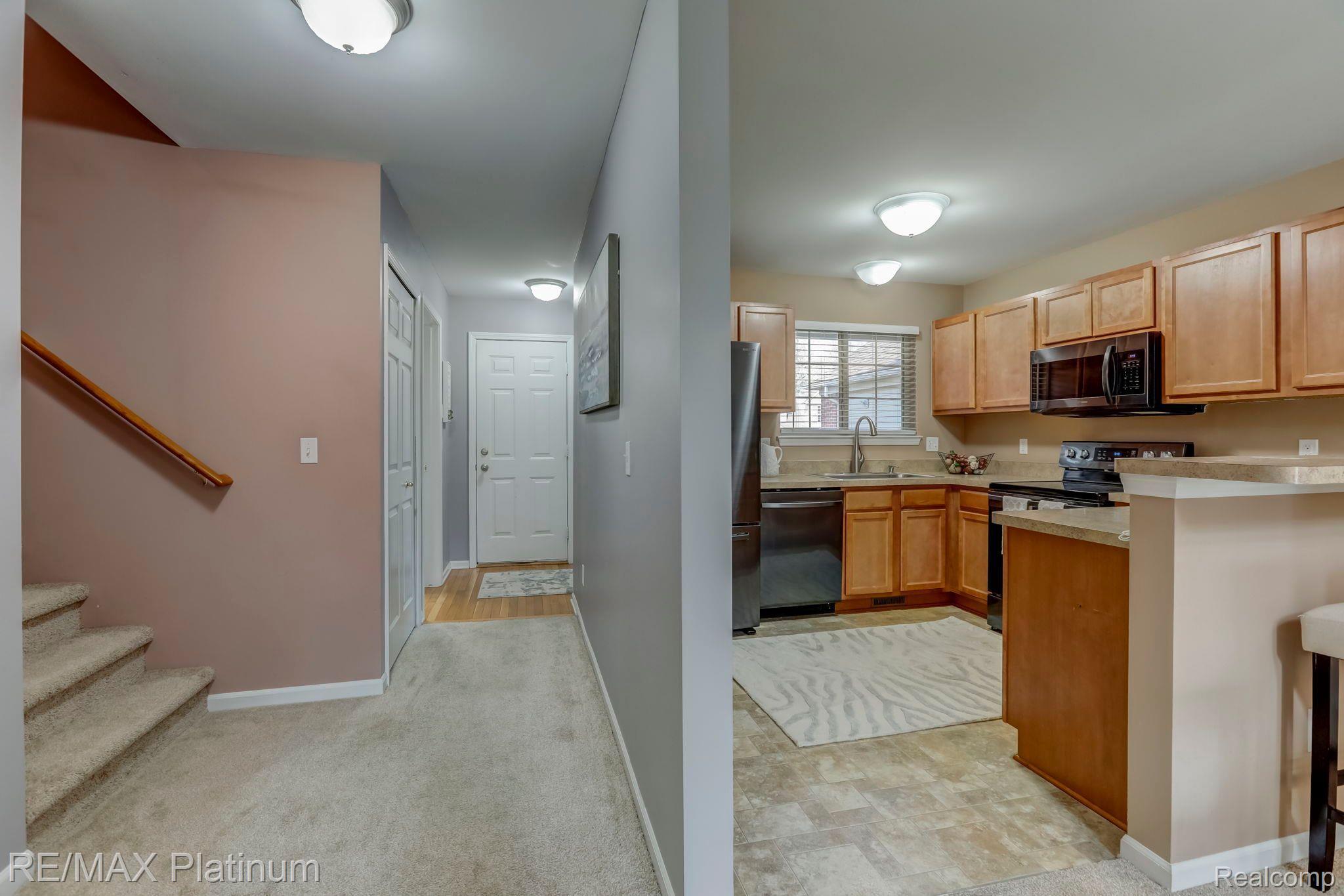 4689 Summer Ridge Drive Howell, MI 48843 - Photo 7 of 32 Foyer with coat closet.