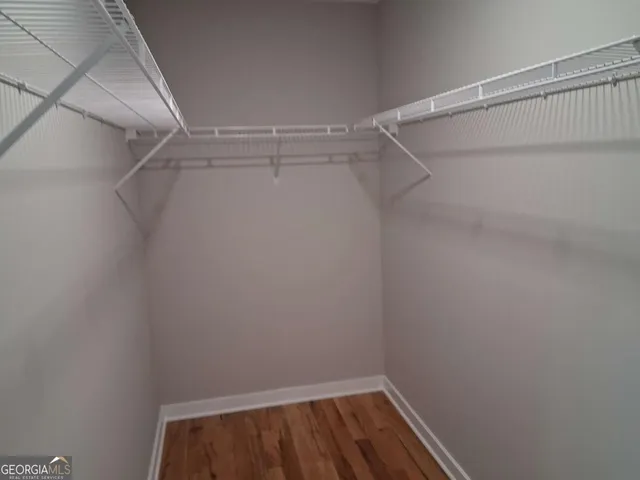 a view of an empty walk in closet