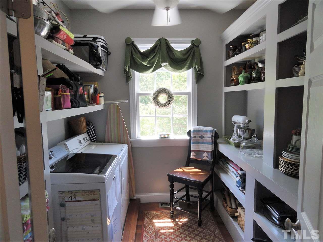 1004 Tyrrell Road Raleigh, NC 27609 - Photo 16 of 25 This is the first floor laundry room!!! Look at this fantastic storage space! Yes, there is a 2nd laundry room on 2nd floor!!!