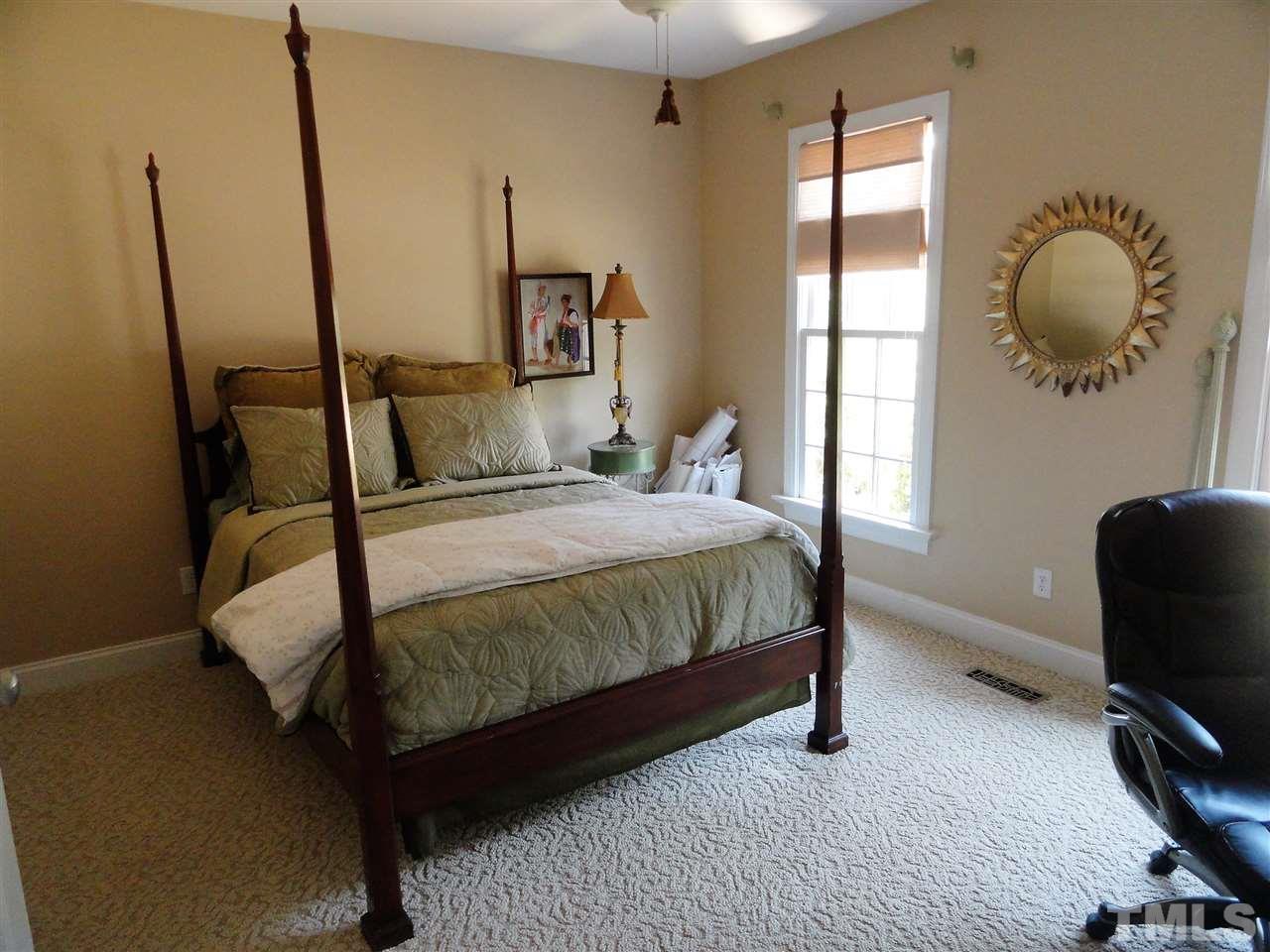1004 Tyrrell Road Raleigh, NC 27609 - Photo 19 of 25 1st floor guest bedroom has full bath with tiled shower and can also be used as an office.