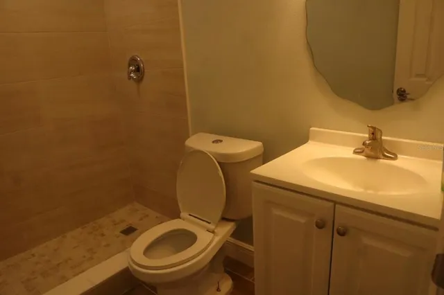a view of kitchen with cabinets and wooden floor