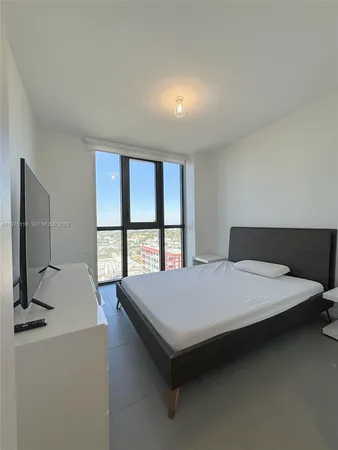 a room with a bed and a table