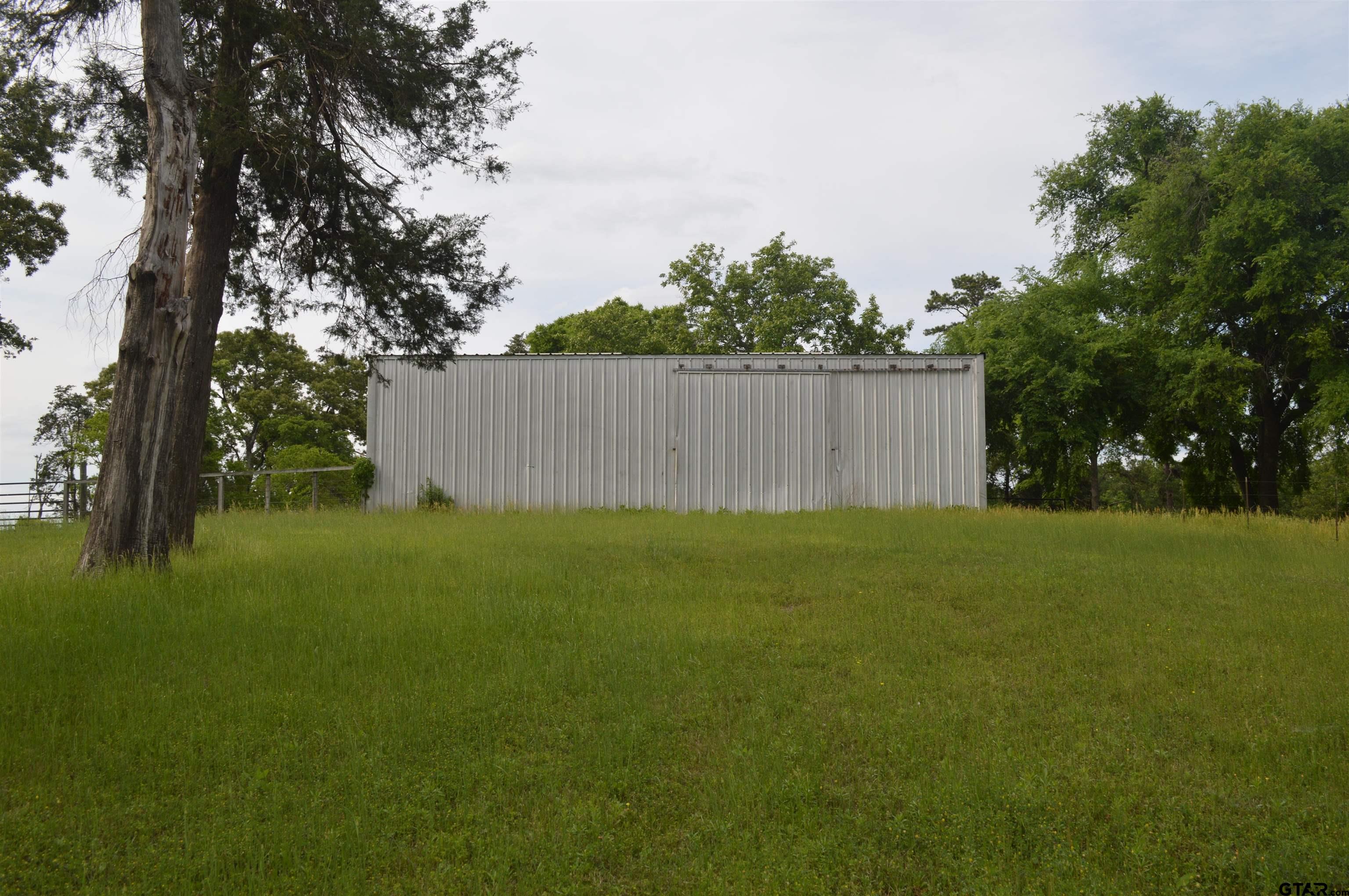 1765 Crabapple Road Gilmer, TX 75645 - Photo 26 of 29 a view of a backyard