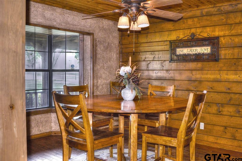 1765 Crabapple Road Gilmer, TX 75645 - Photo 7 of 29 a dining room with furniture and chandelier
