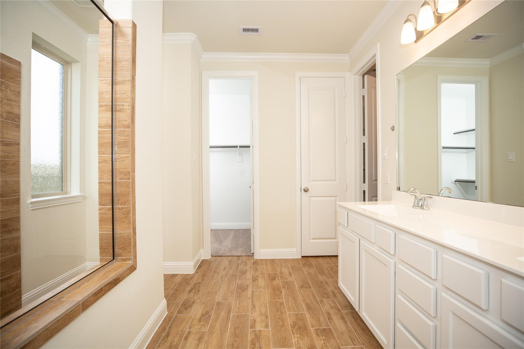 2318 Madera Landing Lane Rosenberg, TX 77469 - Photo 11 of 21 Primary Bathroom with Dual Vanity and Standalone Shower. Shower has seating.