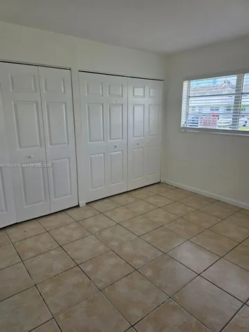 a view of a window in an empty room