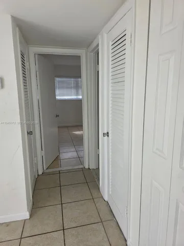 a bathroom with a vanity and a toilet