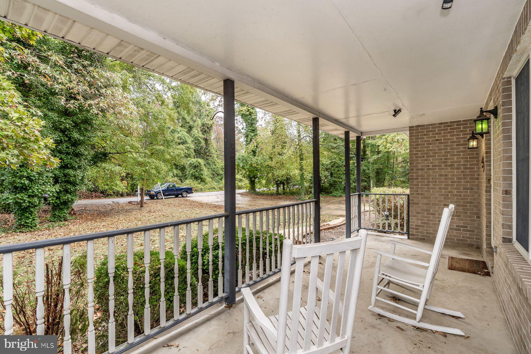 NICE FRONT PORCH YOU COULD SIT AND DRINK COFFEE.