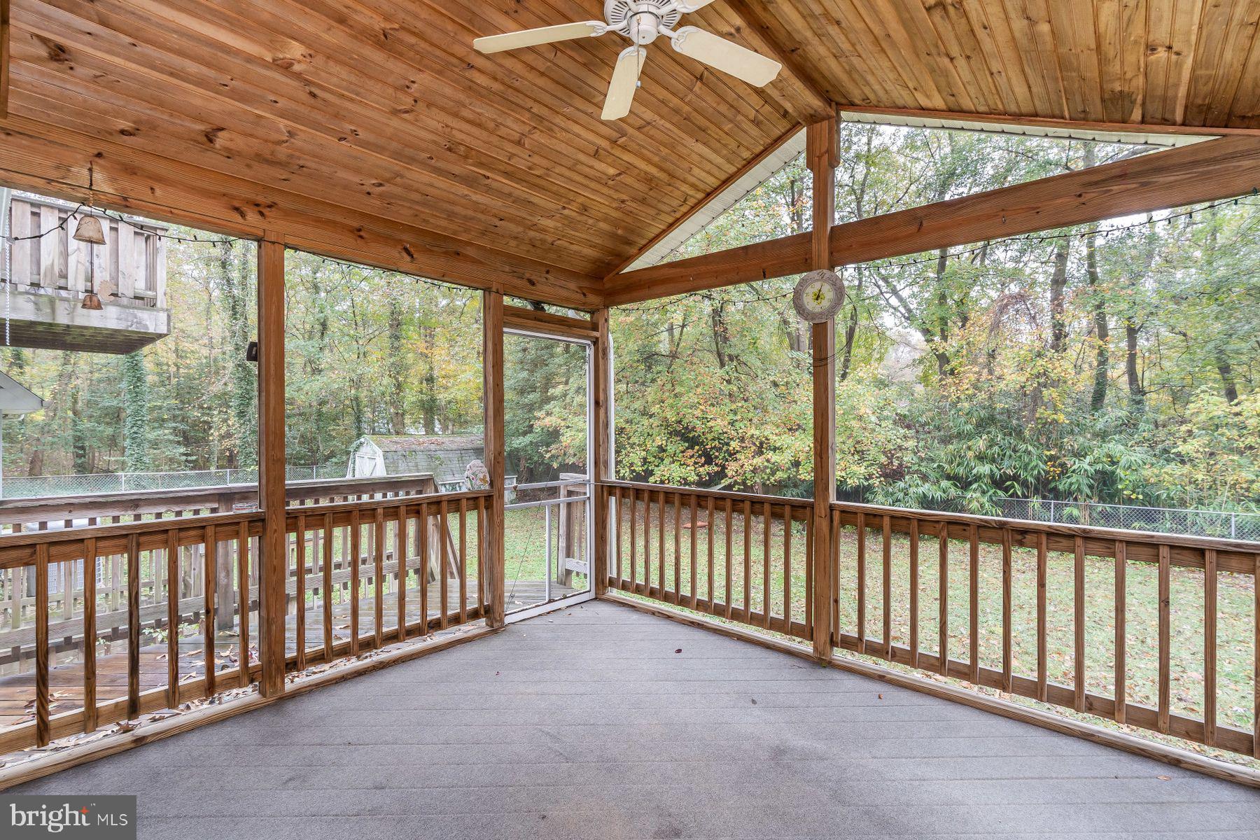 330 Claiborne Road Pasadena, MD 21122 - Photo 50 of 63 SCREEN IN PORCH OF DINNING ROOM