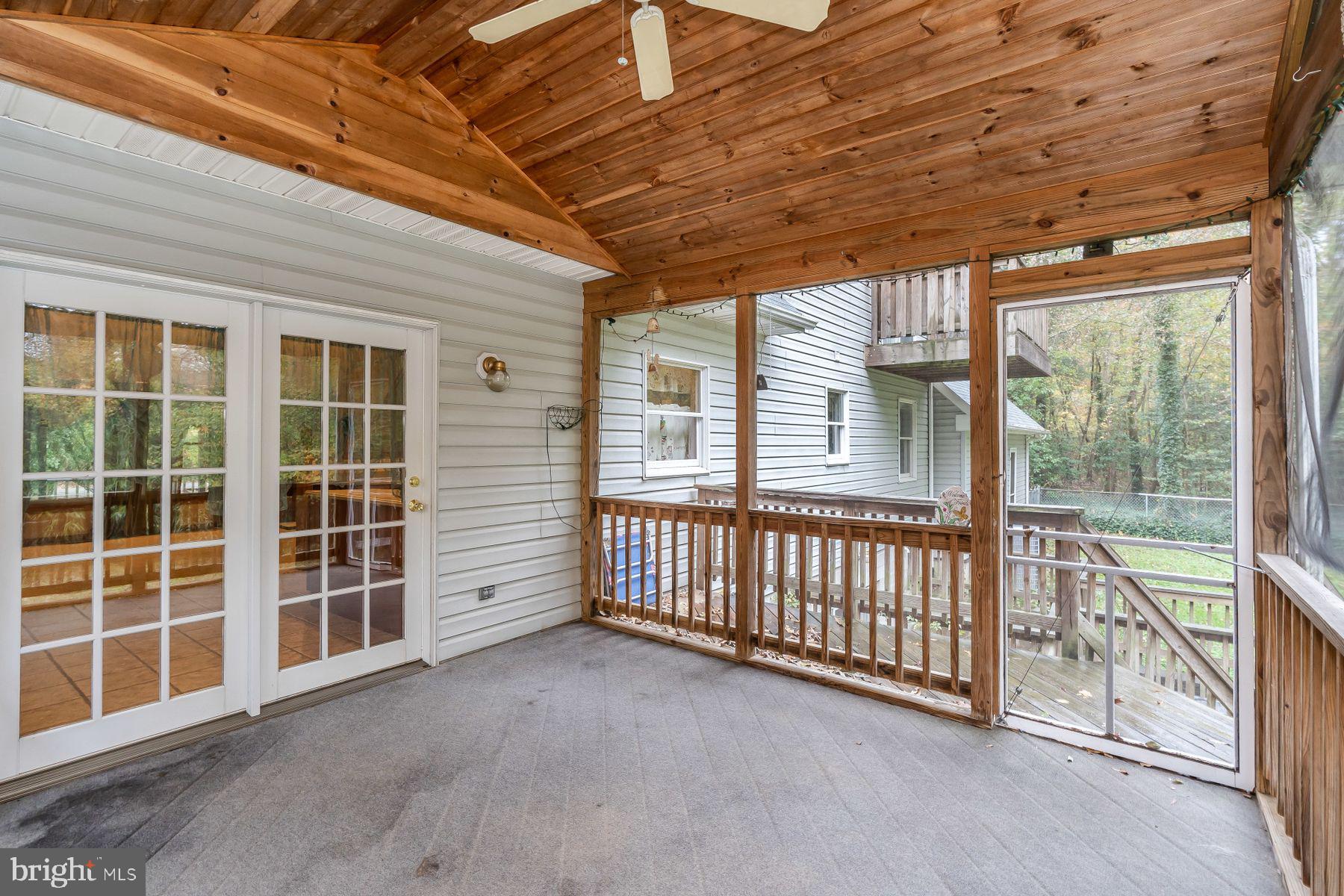 330 Claiborne Road Pasadena, MD 21122 - Photo 52 of 63 SCREEN IN PORCH