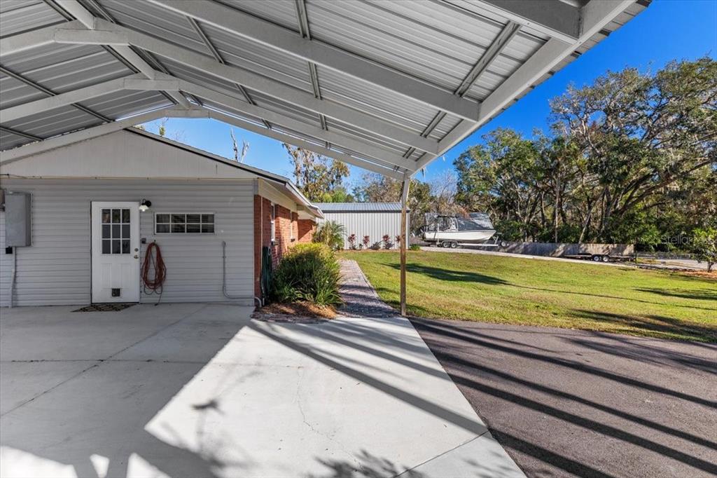 7226 Alafia Ridge Loop Riverview, FL 33569 - Photo 36 of 51 a view of a house with a yard