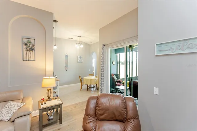 a kitchen with a stove and a refrigerator