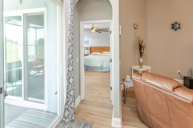 a bathroom with a bathtub sink and mirror