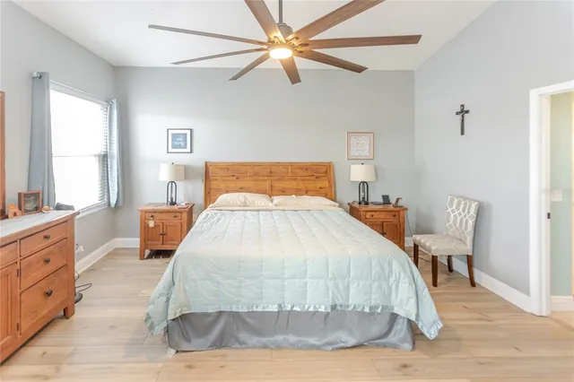 a bathroom with a sink a mirror and a shower