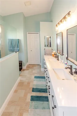 an aerial view of a house with outdoor space