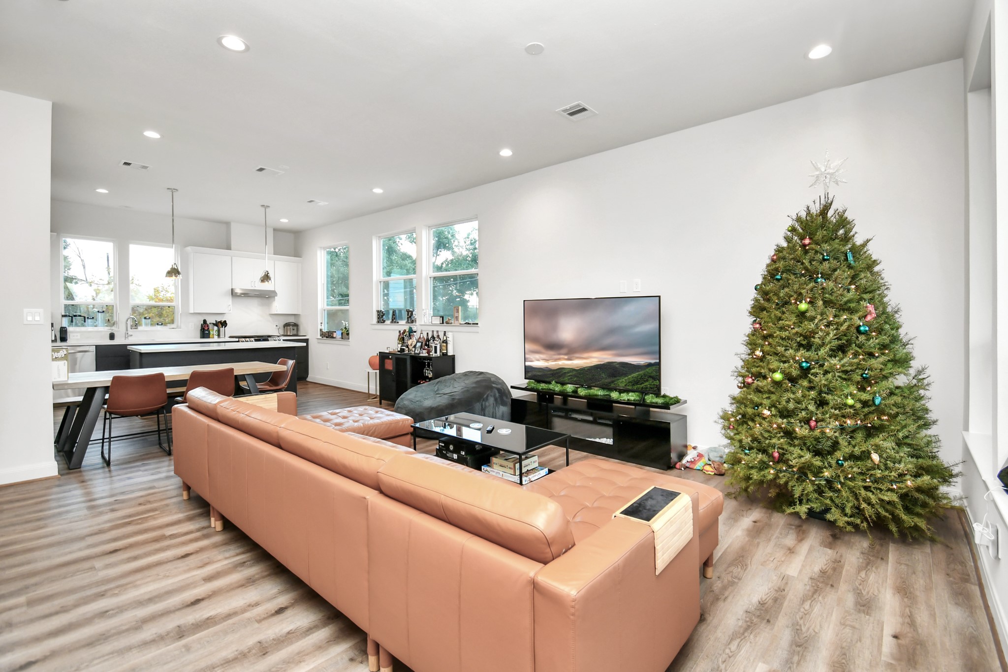 1905 Maury Street, Unit A Houston, TX 77026 - Photo 14 of 44 a living room with furniture and a flat screen tv