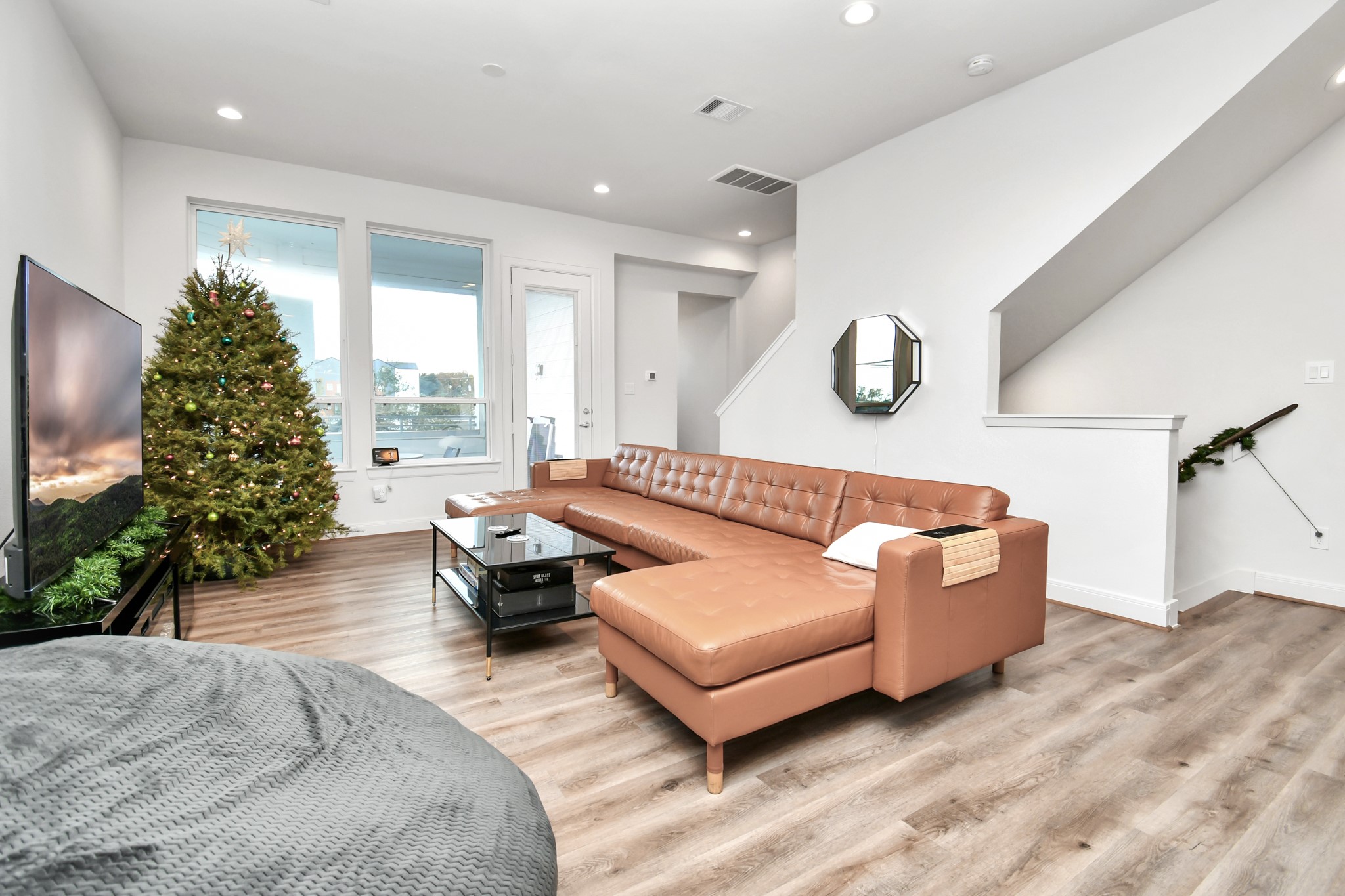 1905 Maury Street, Unit A Houston, TX 77026 - Photo 16 of 44 a living room with furniture and a large window