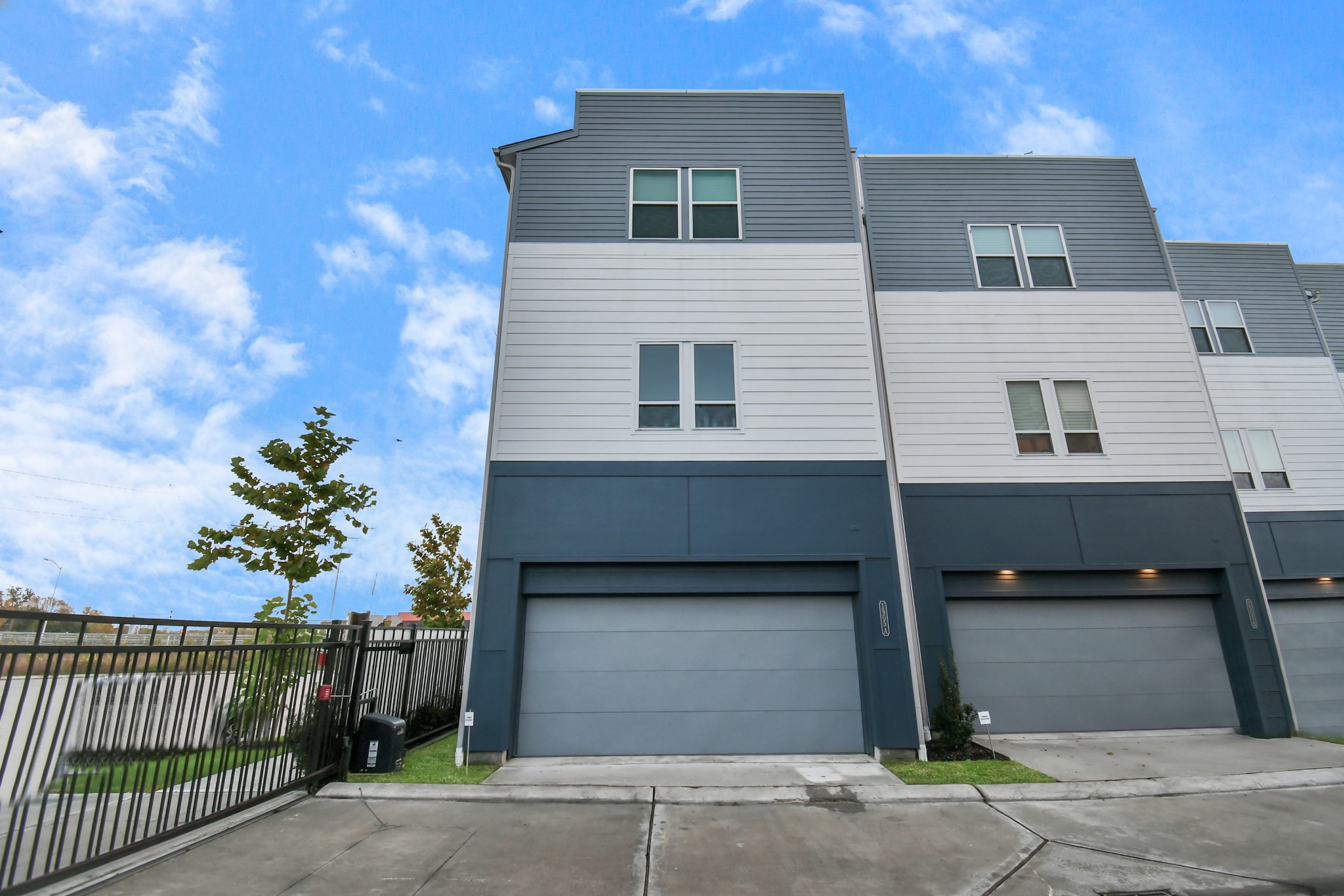 1905 Maury Street, Unit A Houston, TX 77026 - Photo 2 of 44 a front view of a house with a garage