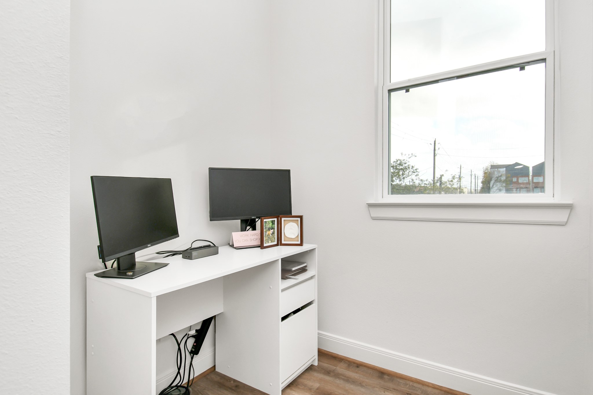 1905 Maury Street, Unit A Houston, TX 77026 - Photo 26 of 44 a view of a workspace with furniture and a window