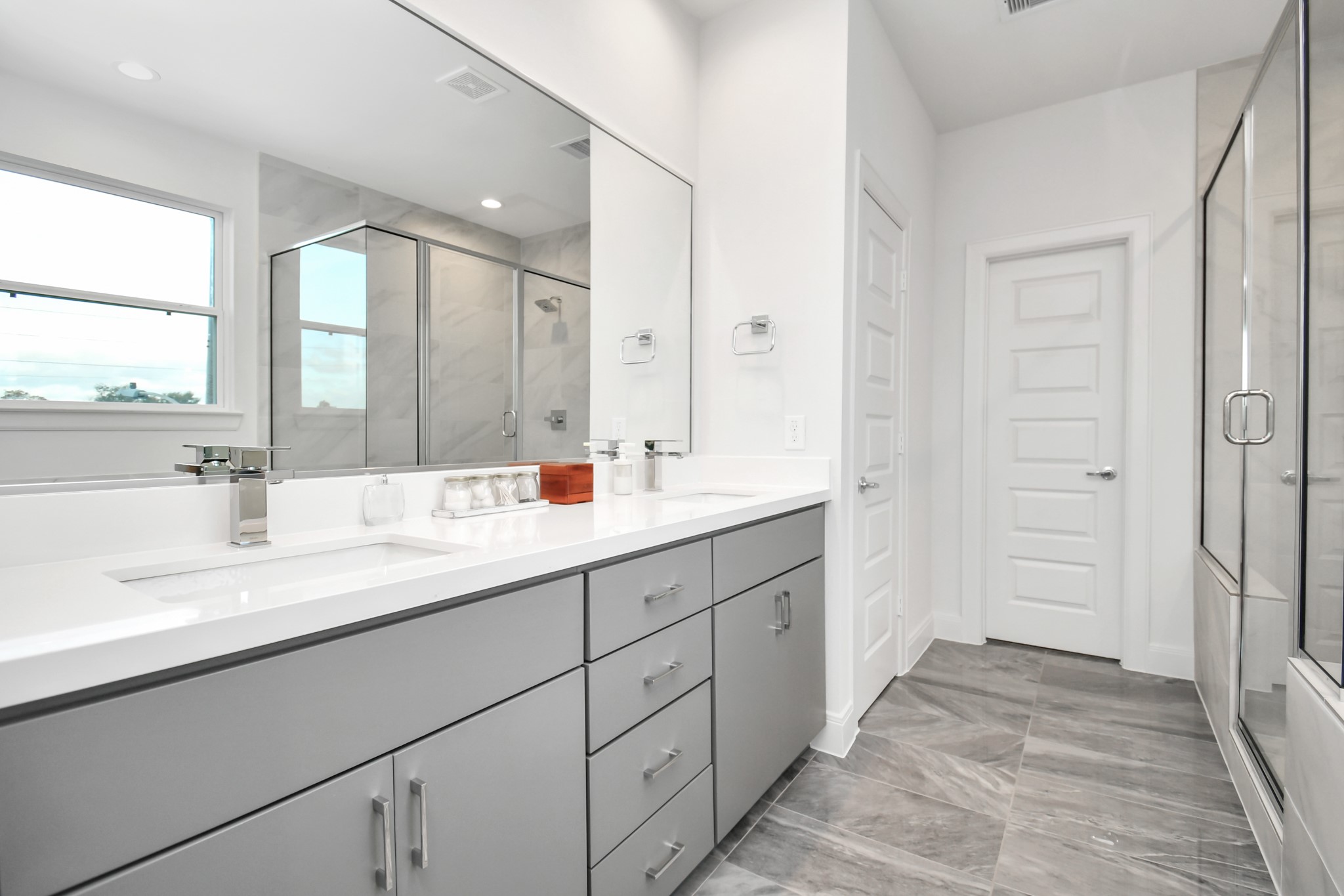 1905 Maury Street, Unit A Houston, TX 77026 - Photo 35 of 44 a bathroom with a sink double vanity and a mirror